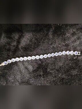 Touchstone Crystal Silver Tennis Bracelet with Purple Crystals